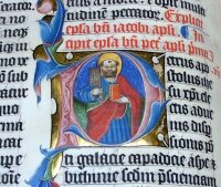 A closeup of the illuminated letter P in the 1407AD Latin Bible on display in Malmesbury Abbey, Wiltshire, England. It was hand written in Belgium, by Gerard Brils, for reading aloud in a monastery. The illumination is a capital letter P since the letters following are ETRUS, making the word PETRUS (Peter in Latin).