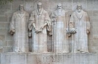 The Reformation Wall in Geneva. From left: William Farel, John Calvin, Theodore Beza, and John Knox 